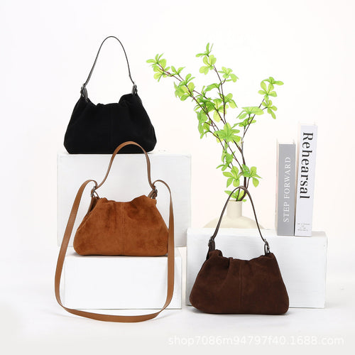 Arden suede-effect crossbody handbag by AVÉRA