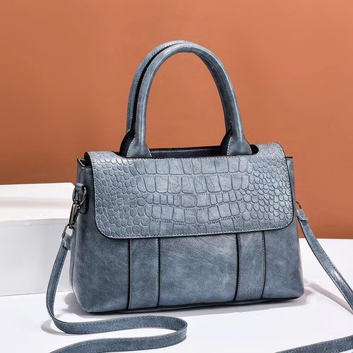 Camille croc-effect structured crossbody bag by AVÉRA